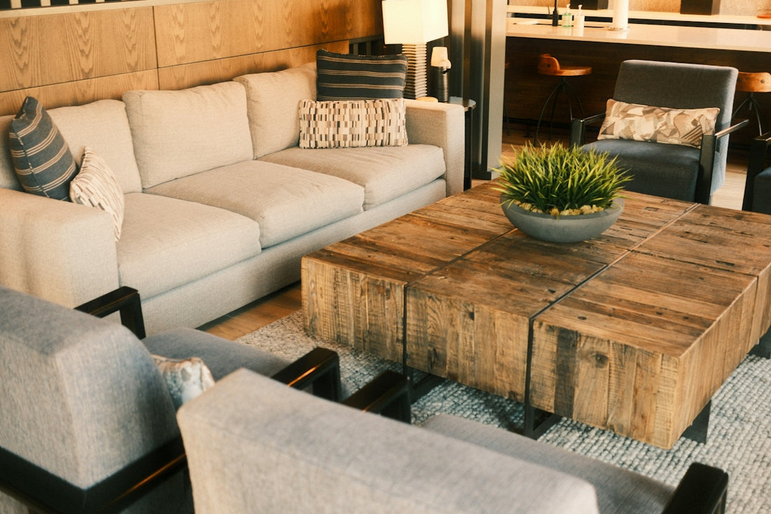 Modern living room with sectional sofa and rustic coffee table
